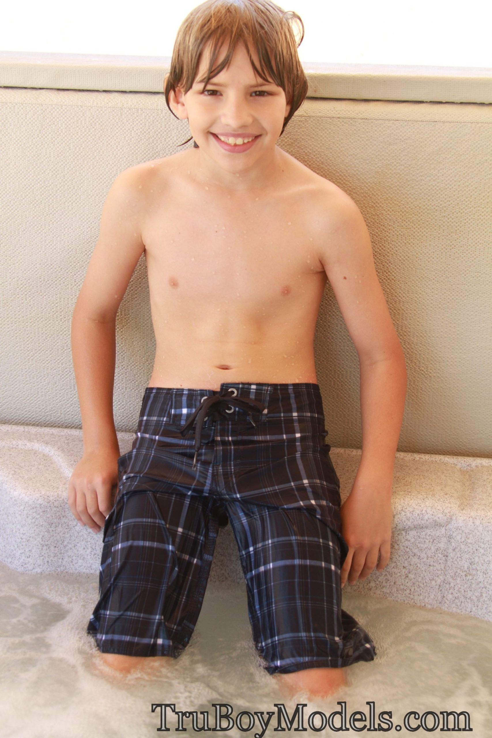 TBM Tristan Pool and Hot Tub Photos - Face Boy